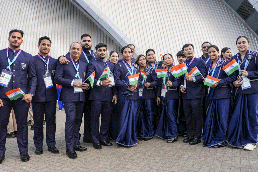 India's weightlifter Saikhom Mirabai Chanu and other athletes of the Indian contingent pose as they arrive for the opening ceremony of the Glasgow 2026 Commonwealth Games at the OVO Hydro, in Glasgow, Scotland, Thursday, July 23, 2026. PTI